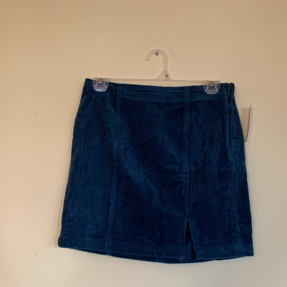 blue ribbed skirt from pac-sun with purposeful slit on front